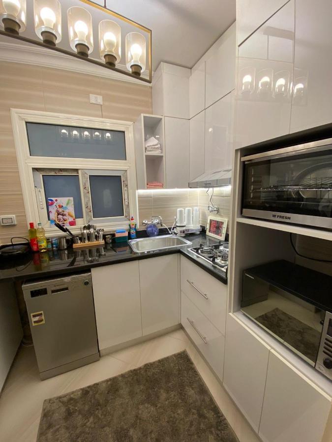 Madinaty Well-Furnished 3- Bedroom Apartment - شقة فندقيه للايجار مدينتي Madinat ash Shuruq Dış mekan fotoğraf